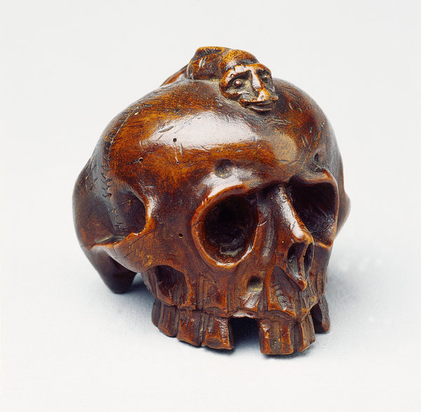 An Interesting Flemish Carved Fruitwood Vanitas of a Human Skull
